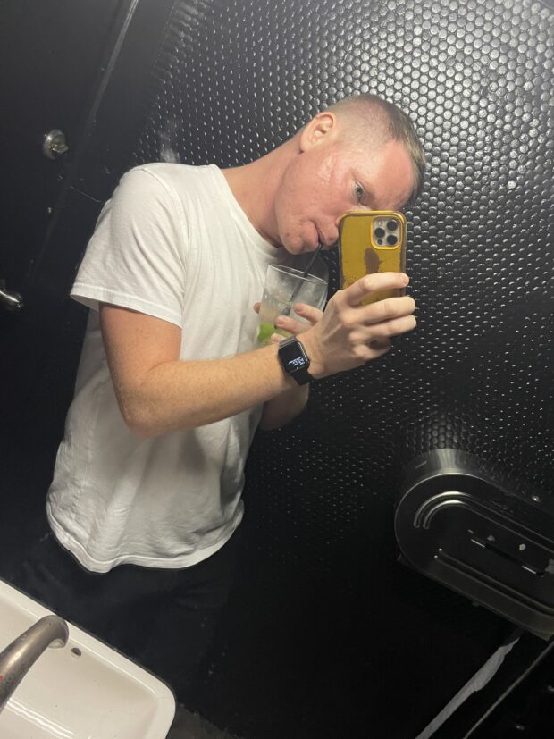 MAcri Gay iconic mirror selfie in bathroom
